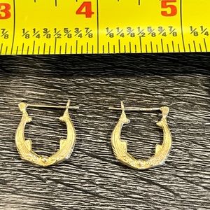 Yellow gold dolphin hoop earrings